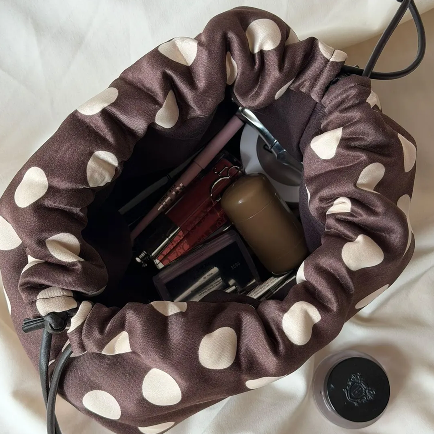 Deep Cocoa Base Oversized Cream Dot Drawstring Storage Pouch With Gathered Wide Opening, Collapsible Rounded Silhouette And Spacious Inner Cavity For Grooming Essentials
