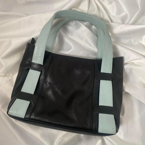 Deep Black Mint Color Block Mini Rectangular Tote With Geometric Side Patch Accents, Curved Mint Grip Loops And Square Metallic Stud Fasteners
