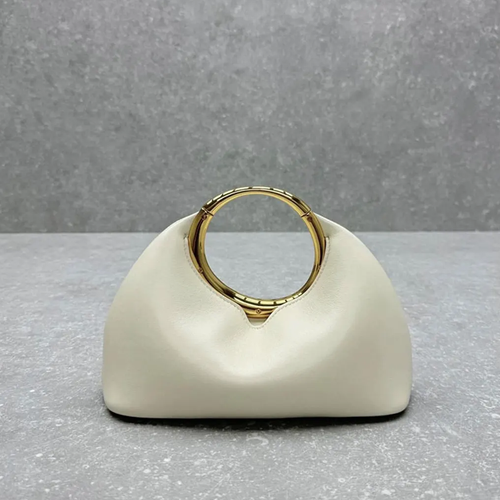 Soft Off-White Crescent Shaped Handheld Pouch With Polished Golden Circular Ring Grip, Central V-Cut Frame And Spacious Curved Open Inner Cavity