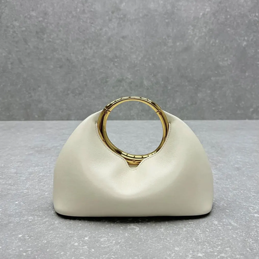 Soft Off-White Crescent Shaped Handheld Pouch With Polished Golden Circular Ring Grip, Central V-Cut Frame And Spacious Curved Open Inner Cavity