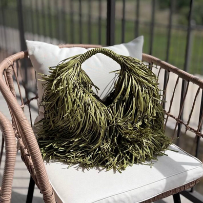 Muted Sage Green Full Fringe Covered Curved Hand Tote With Thick Braided Circular Grip Loop, Wide Open Spacious Inner Cavity And Flowing Layered Strand Detailing