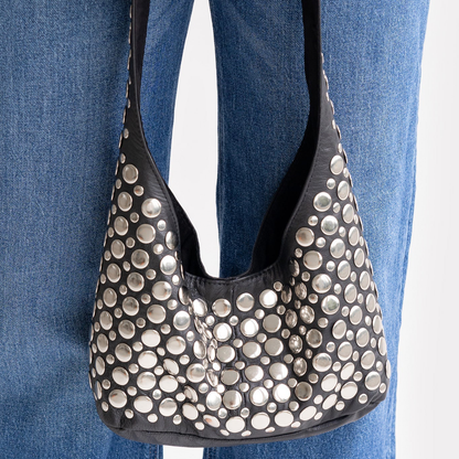 Jet Black Tapered Hobo Shoulder Bag With Scattered Multi-Size Silver Circular Disc Embellishments, Wide Integrated Single Shoulder Strap And Curved V-Shaped Top Opening