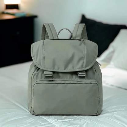Compact Flap Rucksack With Plastic Snap Fasteners, Large Front Zipper Pocket And Padded Wide Rear Support Straps