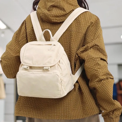 Compact Flap Rucksack With Plastic Snap Fasteners, Large Front Zipper Pocket And Padded Wide Rear Support Straps