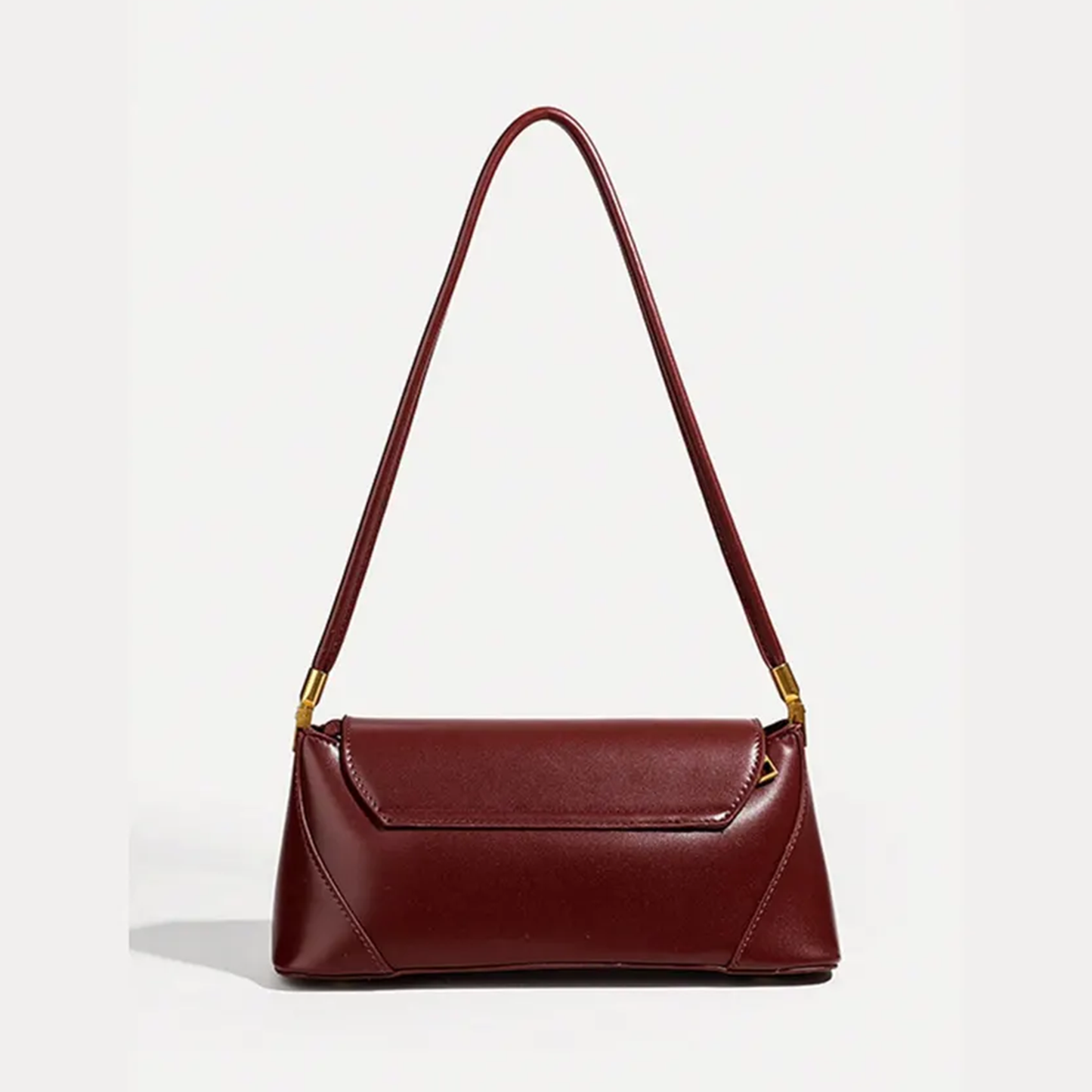 Deep Wine Burgundy Elongated Rectangular Shoulder Bag With Glossy Smooth Surface, Golden Flap Clasp And Slim Single Shoulder Carry Strip